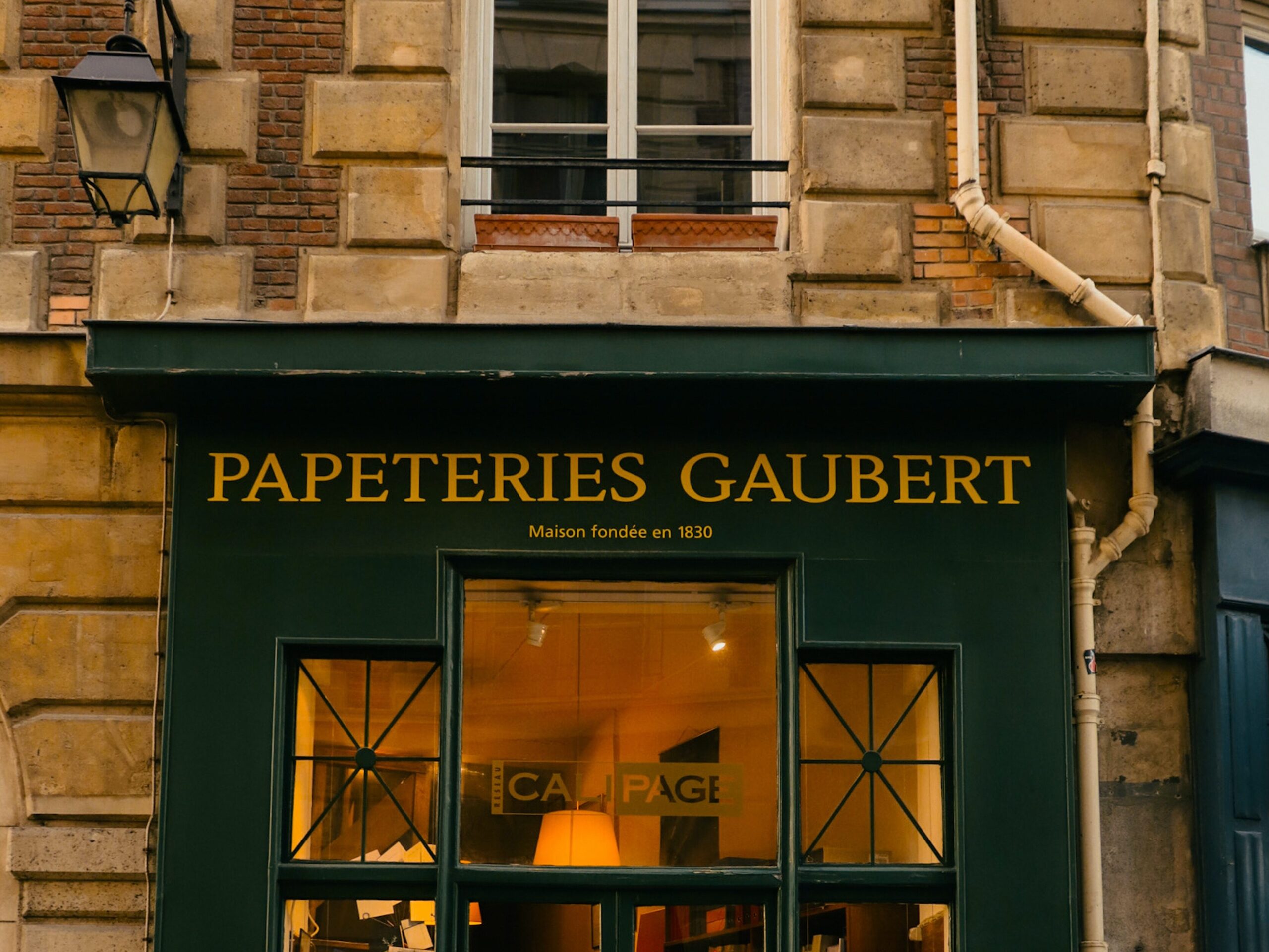 Book shop in Frank with green trim for the blog post 19 Best Books about Different Cultures